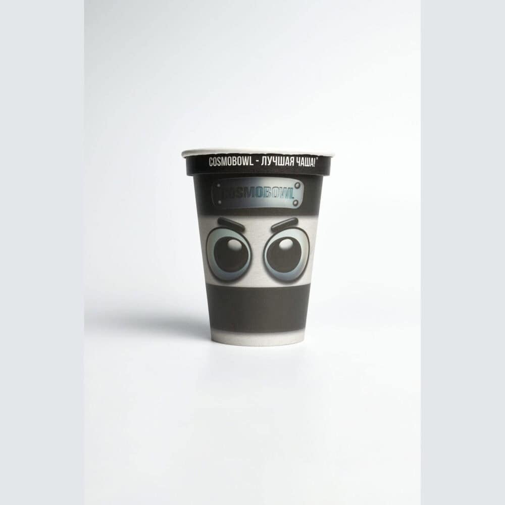 Verpackungsbecher des Cosmo Bowl Assassino Cappuccino mit Augen-Motiv